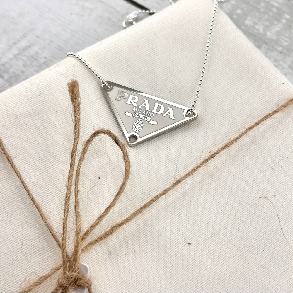 AUTHENTIC Prada charm on sterling silver chain. White and silver. - Picture 5 of 9